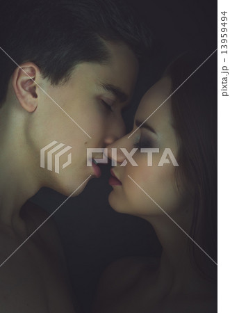 Kissing couple portrait. Instagram toned. 13959494