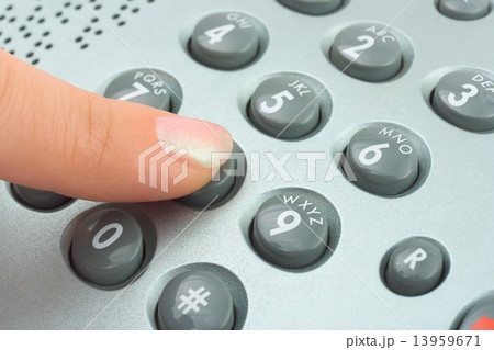 Phone keypad and woman finger 13959671