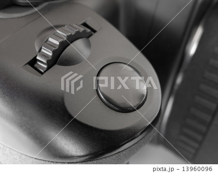 Button on photo camera 13960096