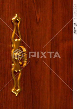 Retro handle on wooden door Retro handle on wooden door 13960290