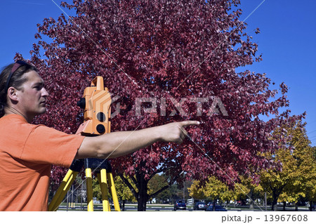 Surveyor with theodolite Surveyor with theodolite 13967608