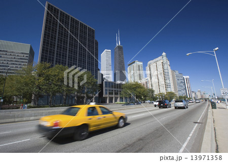 Yellow Taxi driving Lake Shore Drive 13971358