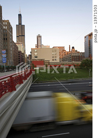 Blurred semi-truck driving in downtown Chicago Blurred semi-truck driving in downtown Chicago 13971503