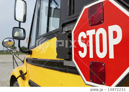 Stop sign on yellow school bus Stop sign on yellow school bus 13972231