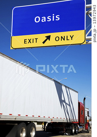 Semi Truck taking exit highway Semi Truck taking exit highway 13972943