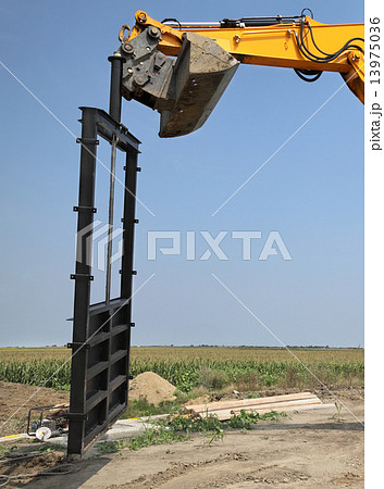 Agriculture, irrigation gate at channel construction site 13975036