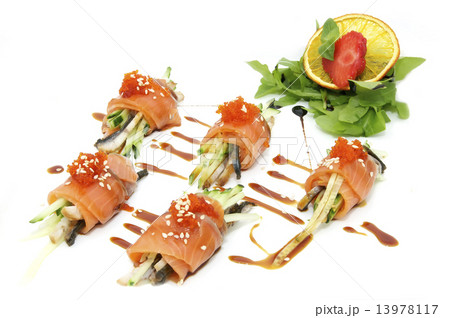 Fish rolls with herbs and fruit on a plate Fish rolls with herbs and fruit on a plate 13978117