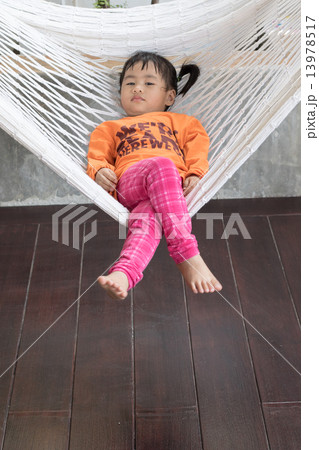 portrait of children realxing in cradle 13978517