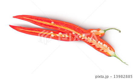 Two halves of red chili peppers Two halves of red chili peppers 13982885