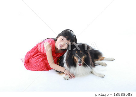 Child girl and pet dog 13988088