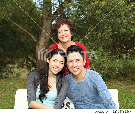 Three generation family at park Three generation family at park 13988167