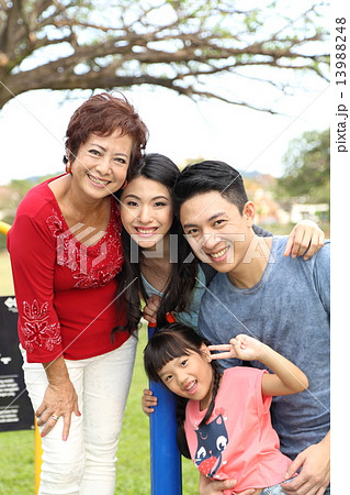 Three generation family at park Three generation family at park 13988248