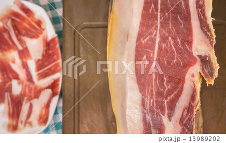 Top view of Serrano ham, plate in the background Top view of Serrano ham, plate in the background 13989202