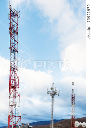 white clouds and cellular antenna 13991979