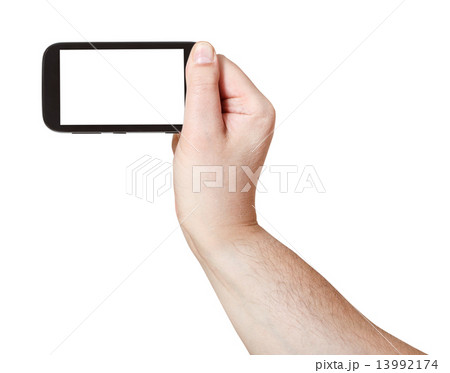 male hand holds smart phone with cut out screen male hand holds smart phone with cut out screen 13992174