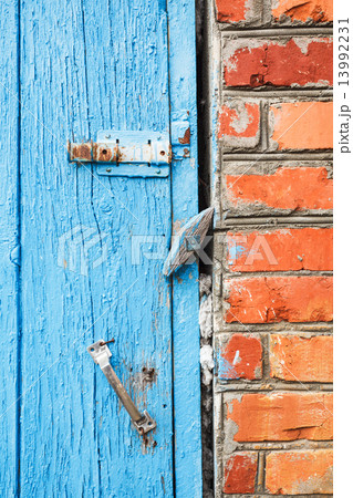 blue painted wooden door with latches 13992231