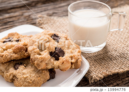 Stack of Chocolate chip cookie and glass of milk Stack of Chocolate chip cookie and glass of milk 13994776