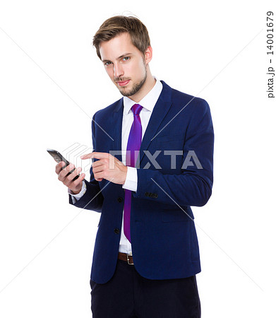 Businessman use of cellphone Businessman use of cellphone 14001679
