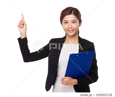 Businesswoman with clipboard and finger point up Businesswoman with clipboard and finger point up 14002216