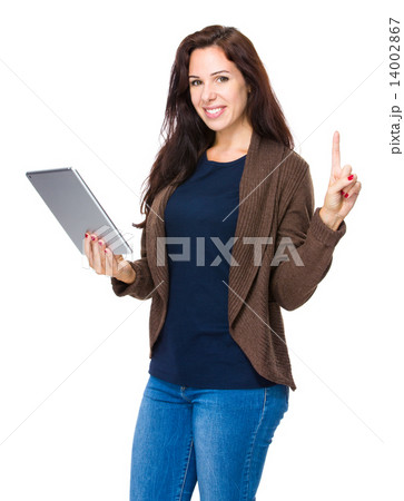 Woman use digital tablet and finger point up 14002867