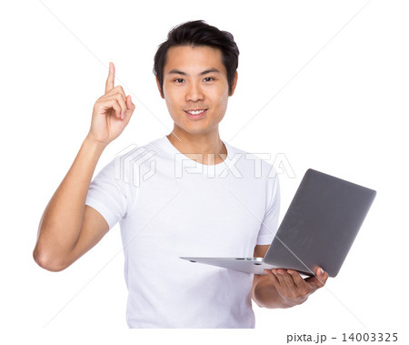 Asian man use of notebook computer and finger up 14003325