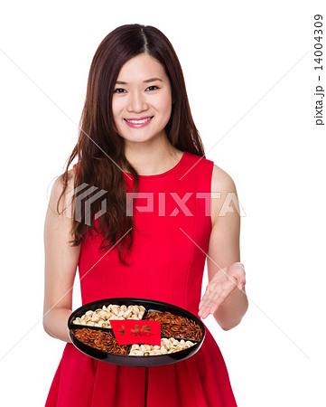 Asian woman hold with snack tray for lunar new year 14004309