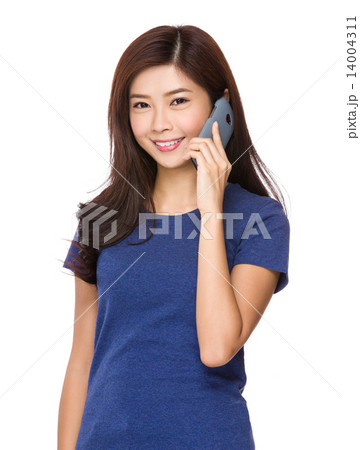 Woman talk to phone Woman talk to phone 14004311