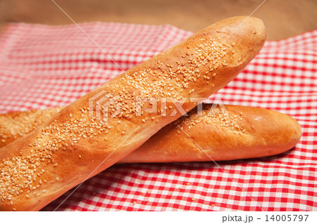 French bread isolated on checkered napkin 14005797