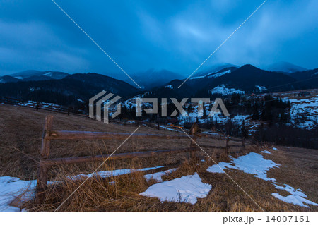 Winter snow covered mountain peaks in Europe 14007161