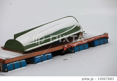 Winter covered with snow rowing boat Winter covered with snow rowing boat 14007883