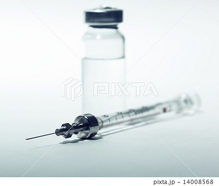 syringe with bottle closeup syringe with bottle closeup 14008568