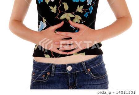 Woman holding her stomach. 14011301