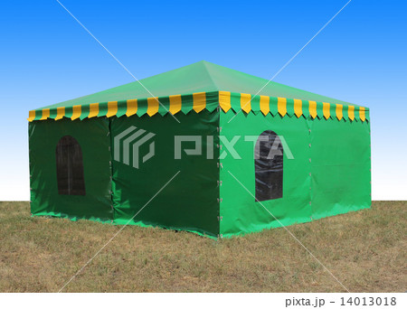 Green very big  tent in the field 14013018