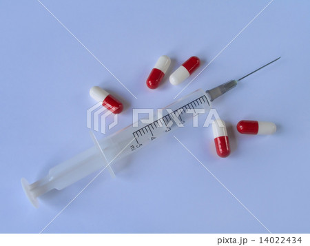 Syringe and pills Syringe and pills 14022434