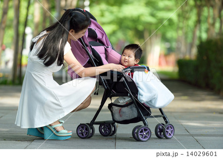 Chinese mother with baby in a stroller 14029601