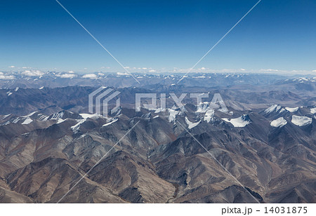 Himalaya mountains under clouds 14031875