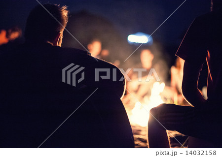 People near a bonfire 14032158