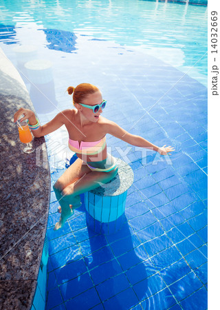 Girl in pool bar Girl in pool bar 14032669