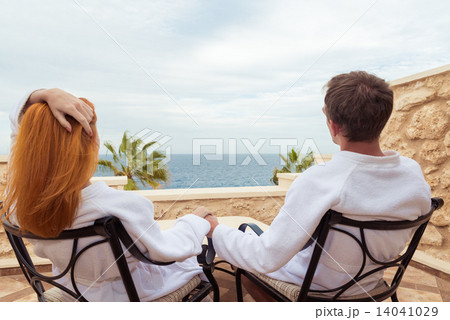 Happy young couple enjoying vacation Happy young couple enjoying vacation 14041029