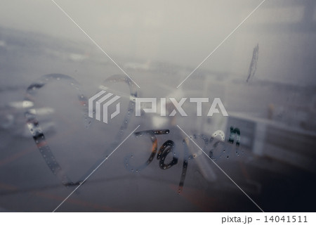 Text love japan on a window airport 14041511