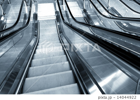 Moving escalator in the business center Moving escalator in the business center 14044922