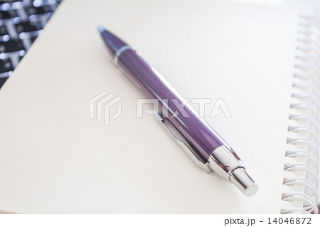Close up notebook with pen 14046872