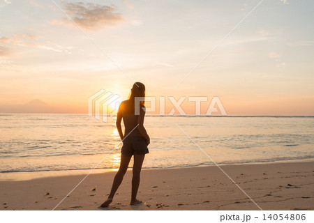 Woman watching sunset 14054806