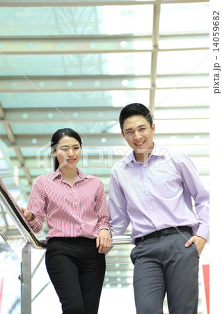 Man woman business executive outdoor pose Man woman business executive outdoor pose 14059682
