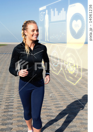 Composite image of fit blonde jogging on the pier 14061236
