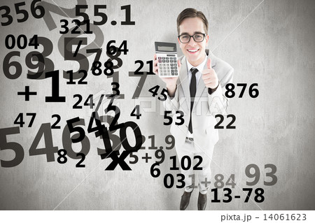 Composite image of geeky smiling businessman showing calculator 14061623