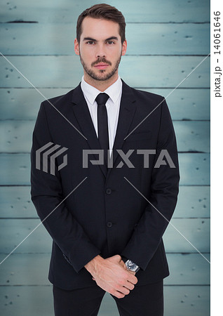 Composite image of portrait of a businessman with his hands join Composite image of portrait of a businessman with his hands join 14061646