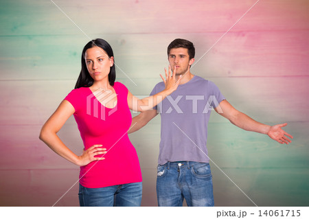 Composite image of young couple having an argument Composite image of young couple having an argument 14061715