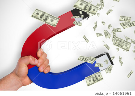 Composite image of magnet attracting dollars 14061961