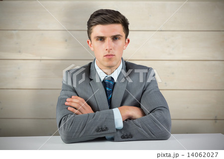 Composite image of serious businessman Composite image of serious businessman 14062027